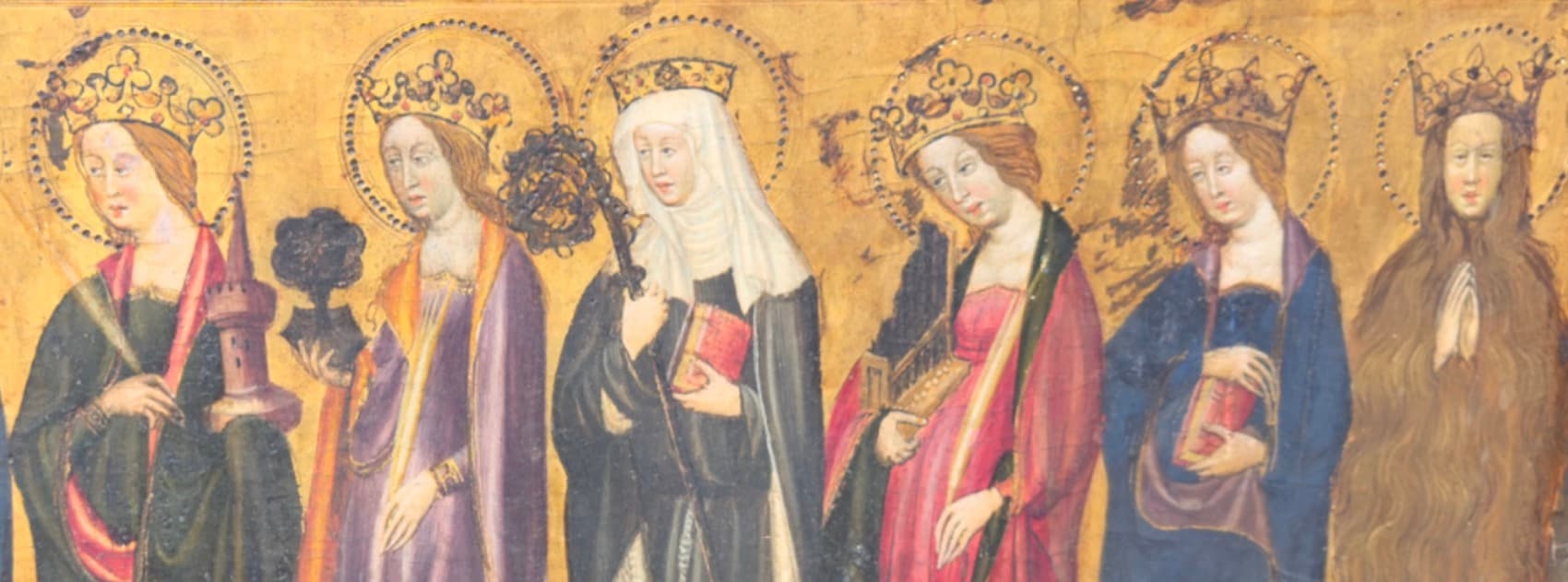 A medieval painting of holy women and female saints